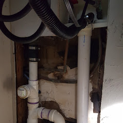 Clothes washer P-trap replacement plumbing repair.