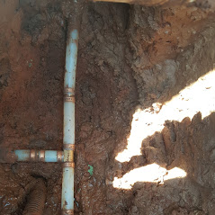 Plumbing repair in the yard on the main service line.